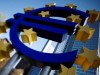 A sculpture showing the Euro currency sign is seen in front of the European Central Bank (ECB) headquarters in Frankfurt April 7, 2011. The picture is taken with a tilt and shift lens. REUTERS/Alex Domanski (GERMANY - Tags: BUSINESS)